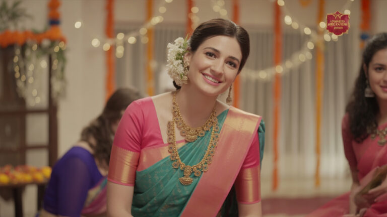 Super Gold, Digi Gold, and a smiling woman wearing traditional Thangamayil Jewellery and South Indian saree during a festival or wedding.